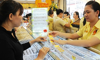 Tỷ giá TT tăng chín đồng, vàng giảm hạ giá
